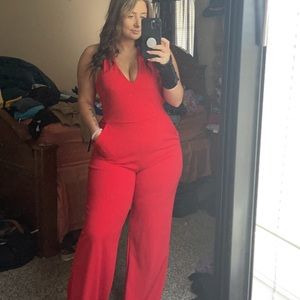 Express red v-neck jumpsuit criss cross back